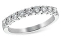Ladies 14 karat white gold anniversary/wedding band containing nine diamonds of H / J color and SI2 / I1 clarity. Diamond weight is available in 1/8 carat total weight up to 1 carat total weight.