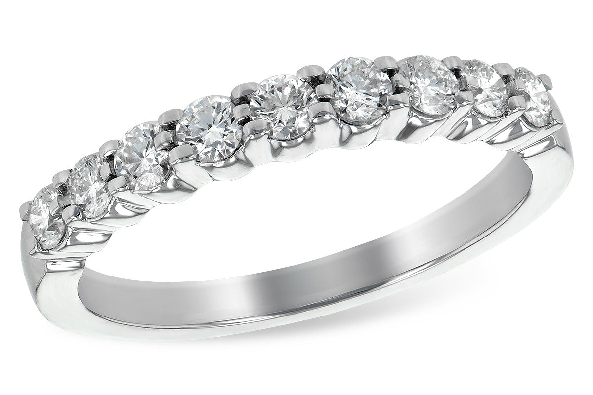 Ladies 14 karat white gold anniversary/wedding band containing nine diamonds of H / J color and SI2 / I1 clarity. Diamond weight is available in 1/8 carat total weight up to 1 carat total weight.