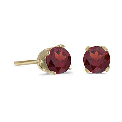 14 karat yellow gold 4mm Garnet stud earrings.