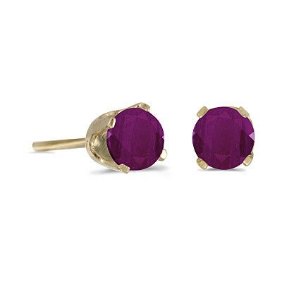 14 karat yellow gold 4mm Ruby stud earrings.
